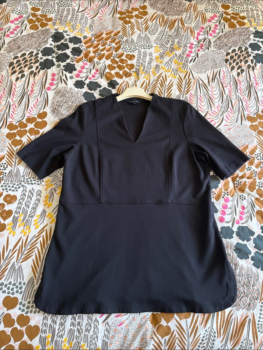 Ladies’ Lands End black, v-neck, short-sleeve top was worn only once. Size 16